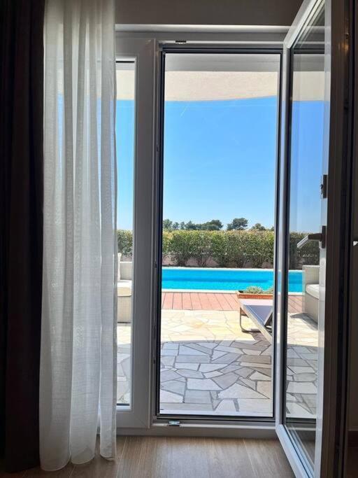 Blue Apartment With Shared Pool Split Exterior photo